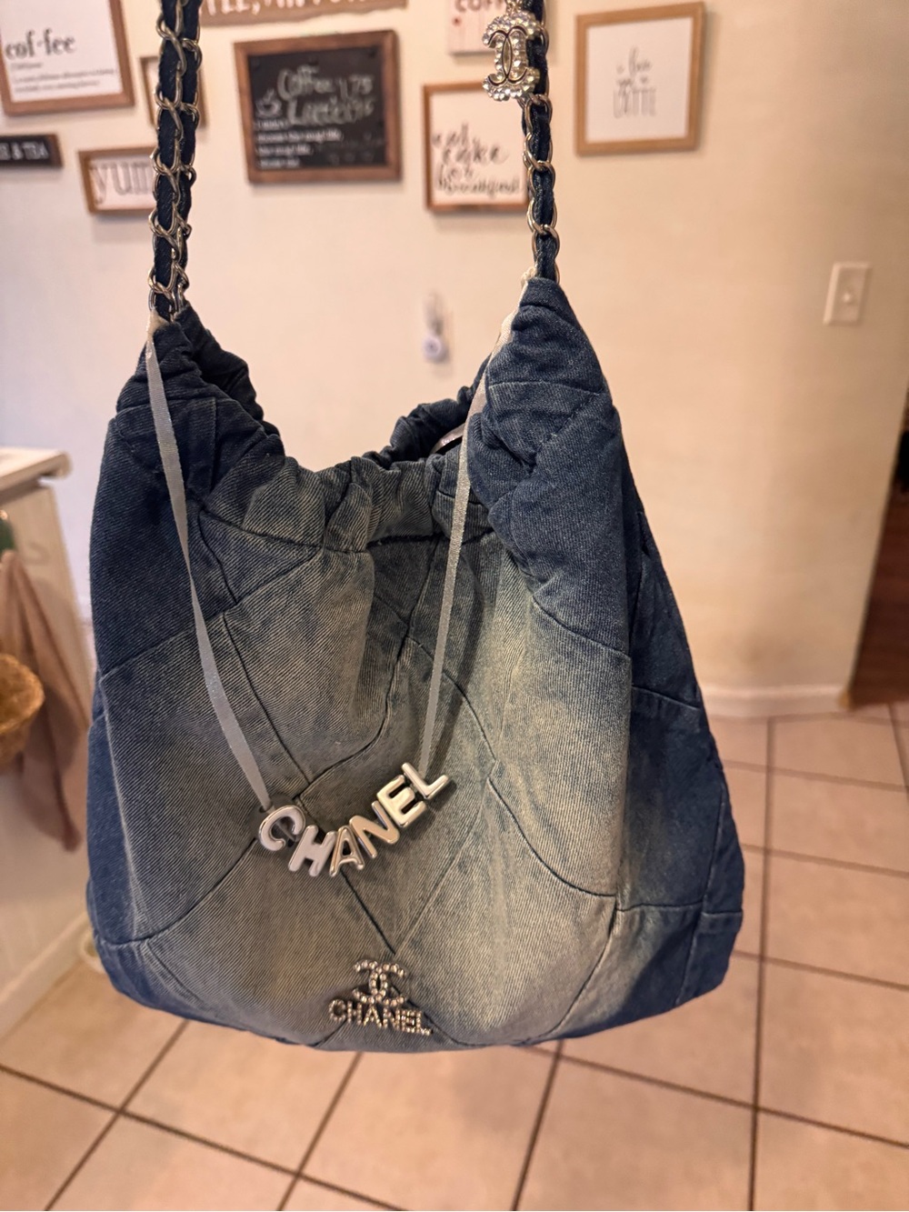 CHANEL Denim Quilted Hobo Bag in Faded Blue